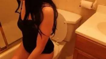 Cutie pooping in the toilet